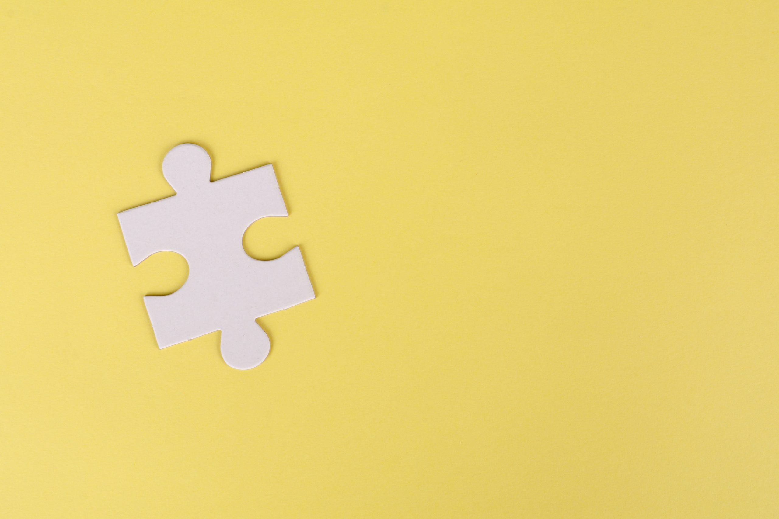 jigsaw-puzzle-on-yellow-background-3482443