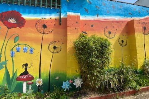 mural little girl dandelion 