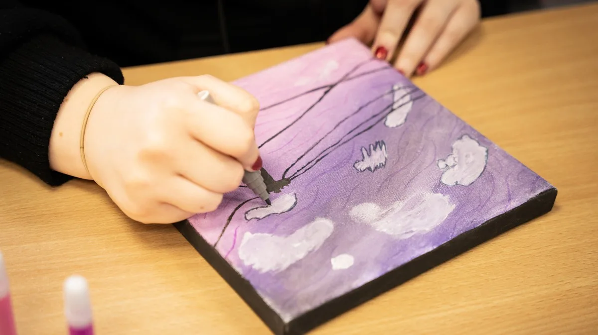 close shot on hand painting, artwork visible