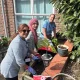 3 women working on the raised planters - websize