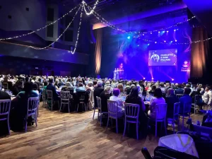 A view of the room of tables at the awards night