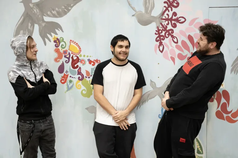 Three young males residents of YMCA Downslink Group accommodation to show issue of supporting young people into adulthood