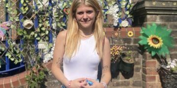 Alysha smiling in the Horsham Y Centre Garden