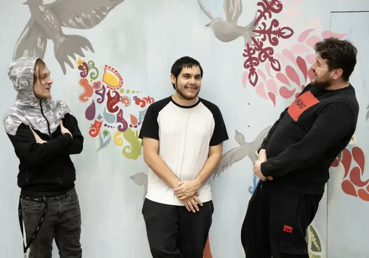 Three young males residents of YMCA Downslink Group accommodation to show issue of supporting young people into adulthood